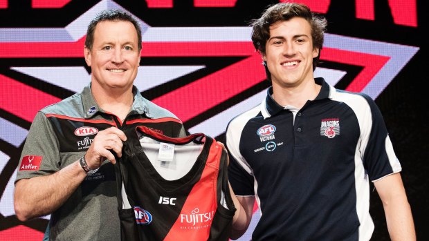 Number one pick Andrew Mcgrath with Essendon coach John Worsfold.