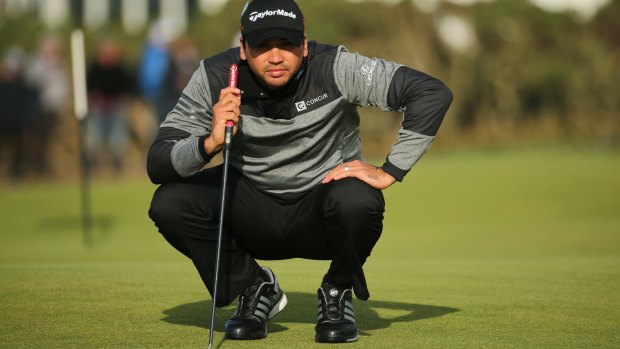 Jason Day escaped with a one-under 71 after a tumultuous third day at the British Open.