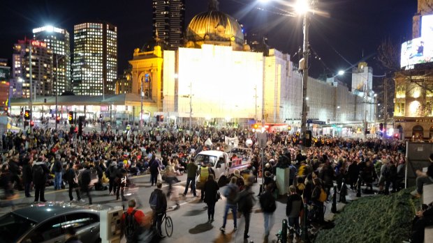 Protesters block the intersection outside Flinders Street Station in the rally for Elijah Doughty.