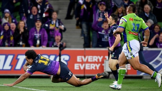 Stroll: Felise Kaufusi of the Storm dives over to open the scoring.
