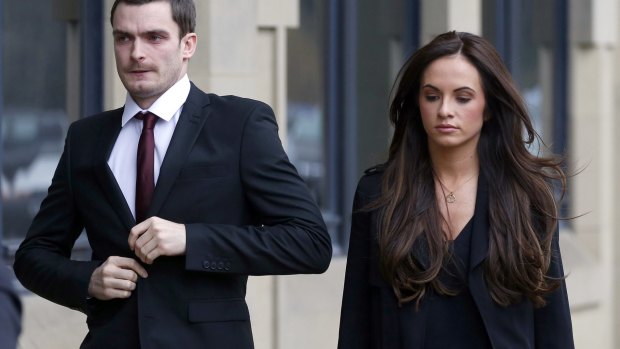 Former Sunderland and England soccer player Adam Johnson, 28, pictured with partner Stacey Flounders outside Bradford Crown Court.