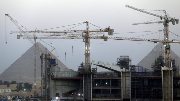 Construction is seen at the new museum in front of the Giza pyramids area, on the outskirts of Cairo last month.