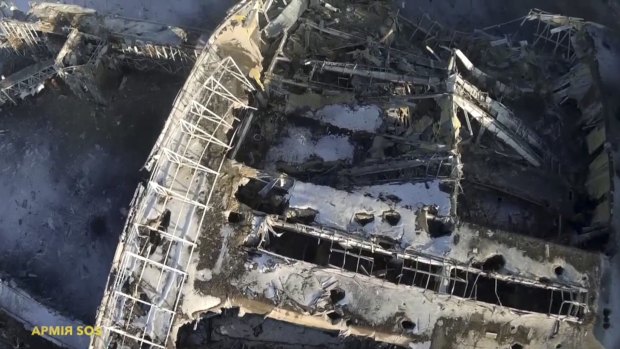 An aerial photo shot by a drone shows the damaged terminal building at Donetsk Airport.
