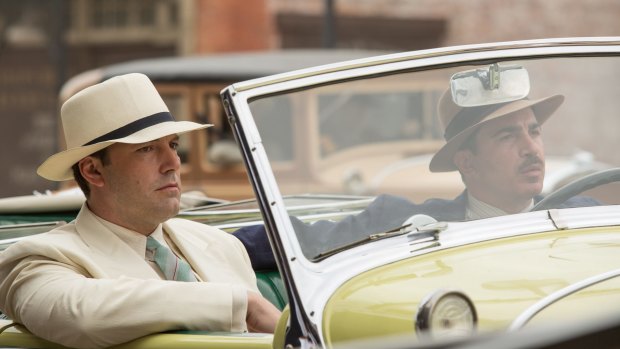 Ben Affleck as Joe Coughlin and Chris Messina as Dion Bartolo in Live by Night.
