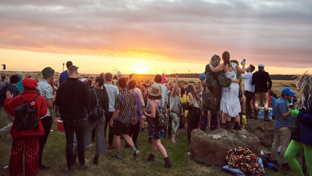 Fans enjoy the sunset as much as the music.