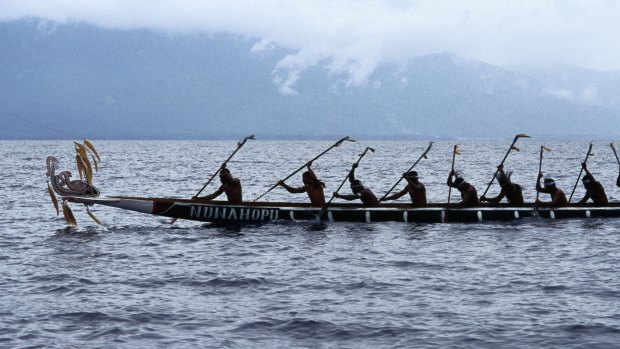A war canoe takes part in the annual festival in Alotau.