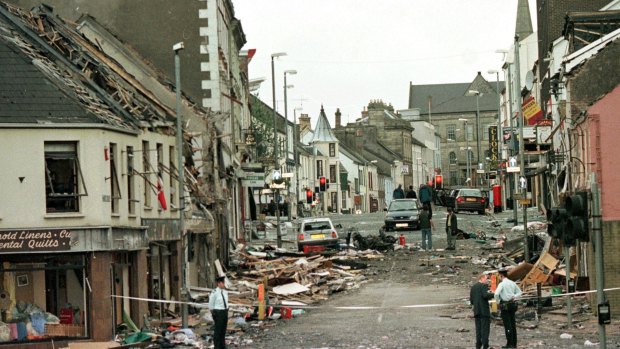 Royal Ulster Constabulary Police officers at the scene of a car bombing in the centre of Omagh, 115km west of Belfast, Northern Ireland, in 1998.