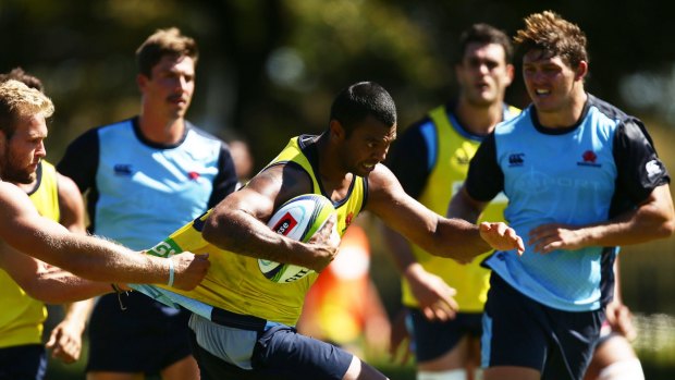 Playmaker: Kurtley Beale trains with the Waratahs.