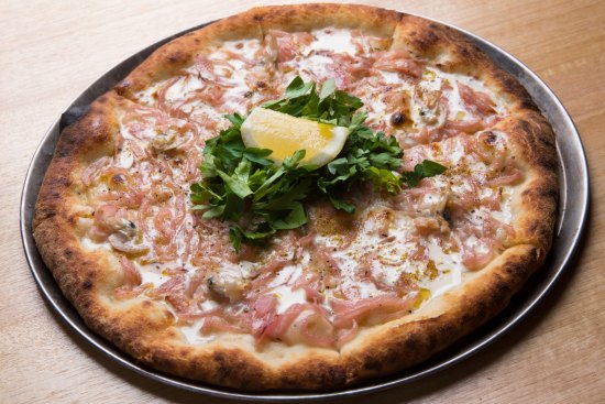 Go-to dish: Goolwa pipi pizza with parsley, lemon and cream.