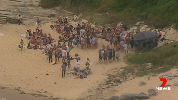 Police broke up a large beach party in Little Bay on Christmas Day. 