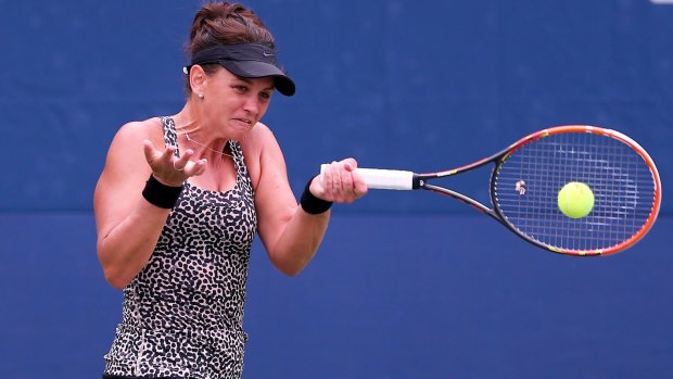 Struggle: Casey Dellacqua exited after a first-round defeat to Estonia's Anett Kontaveit.