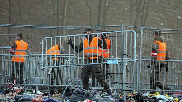 Fences go up on the Austrian-Slovenian border on Wednesday.