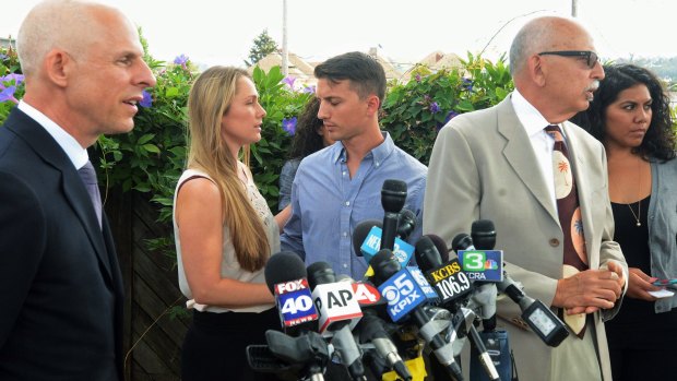 Denise Huskins and boyfriend, Aaron Quinn at a news conference on Monday. 