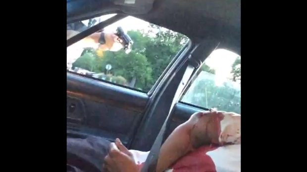 A still from the Facebook live video showing a police officer shooting Philando Castile.