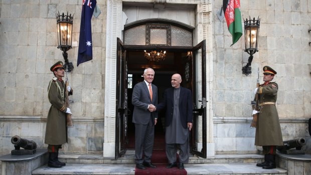 Mr Turnbull and Dr Ghani outside the palace.