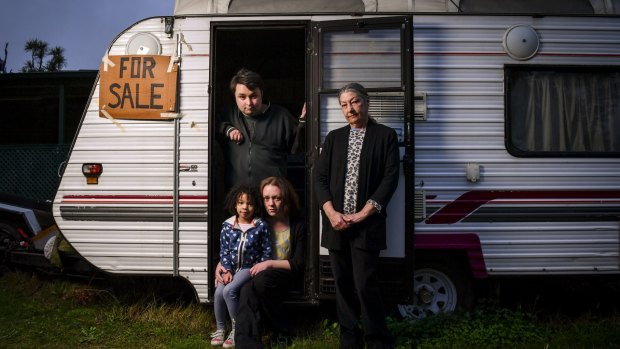 The Hill-Berko family in the caravan they're trying to sell to enable them to stay together if Maria  is deported back to Britain. 