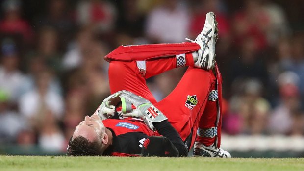 Night to Forget Part I: Peter Nevill lies on the ground after being struck in the head against the Sixers.