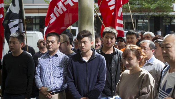 Chinese workers protesting out the front of Lend Lease in Docklands over unpaid wages. 