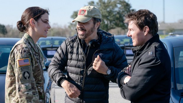 Edward Zwick, centre, with Cobie Smulders and Tom Cruise on set.