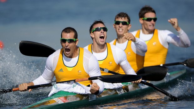 Tate Smith, Dave Smith, Murray Stewart, and Jacob Clear of Australia celebrate winning the gold in the men's kayak four (K4) 1000m canoe sprint at the London Olympics in August 2012.