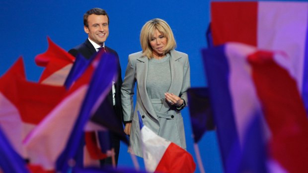 Emmanuel Macron and his wife Brigitte last month.