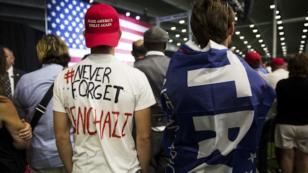 Supporters wait to see Donald Trump in Westfield, Indiana. The Republican Party platform contained criticism of Hillary Clinton, whose role in the death of US personnel in Benghazi has become an article of faith for Republican activists.