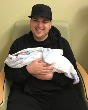 Dream Kardashian with her father Rob.