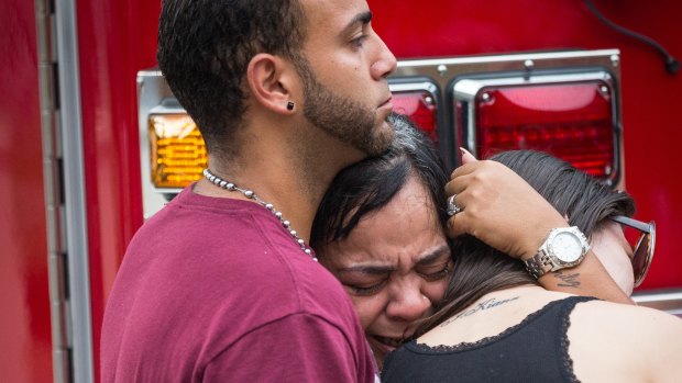 Friends and family grieve after a list of hospitalised victims is released, implying the death of missing ones not on the list.