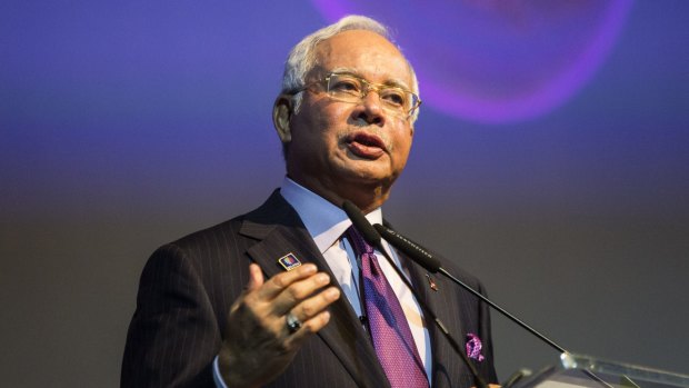 Prime Minister Najib Razak speaking at the Invest Malaysia Conference in Kuala Lumpur last year. Critics of the new 'death by stoning' law are concerned it may frighten investors.