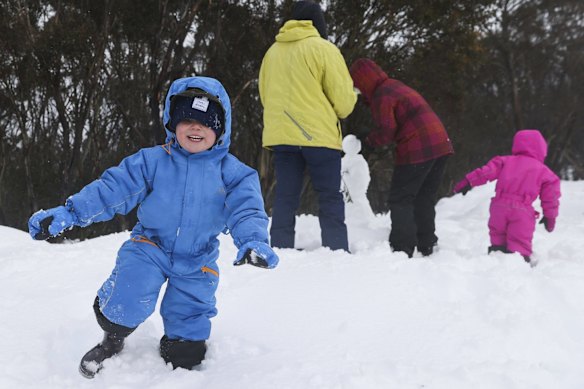 Geoffrey, Chris, Jody and Florence McDowell from the northern beaches, during opening day of the ski and snowboard season at Thredbo resort, on Saturday 12 June 2021. fedpol Photo: Alex Ellinghausen