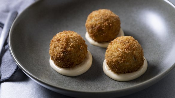 Arancini with almond and taleggio.