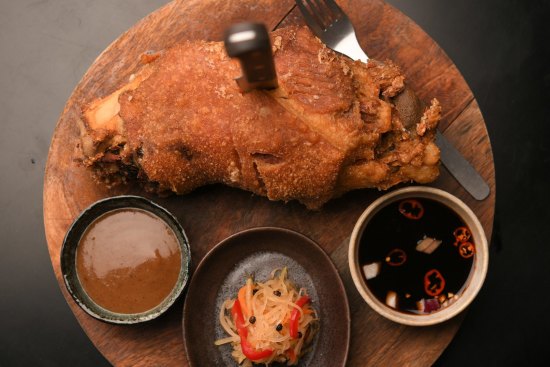 Pata (deep-fried pork knuckle with condiments).