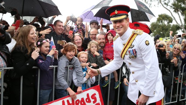 Prince Harry, with Ethan Toscan, 12, at the Australian War Memorial. 