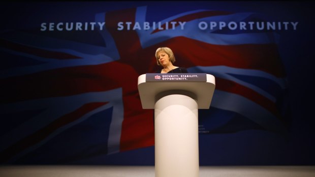 Mrs May told the conference it is "impossible to build a cohesive society" if immigration was too high and that Britain needs to have an immigration limit. 