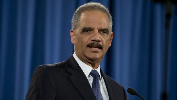 Attorney General Eric Holder speaks at the Justice Department in Washington.