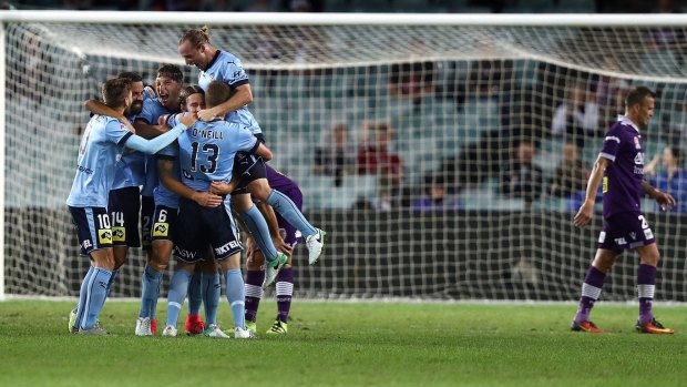 Playing soft and loose: Sydney FC overcame Perth Glory and a terrible pitch to reach the A-League grand final.