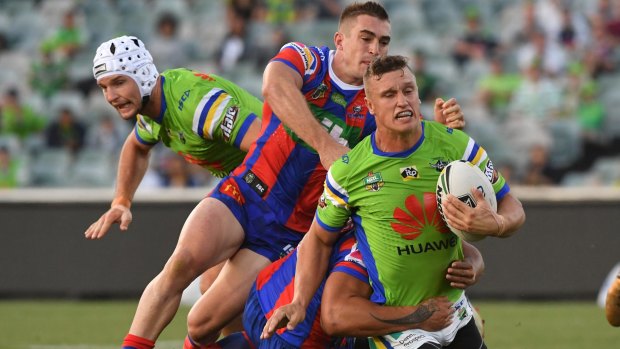 Jack Wighton is reined in by the Knights' defence.