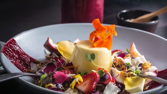 Picture perfect mango and saffron panna cotta with granola, strawberries, passionfruit, raspberry and coconut at Tinker in Northcote.