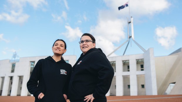 Talei Elu and Hope Davison outside parliament house. They are part a group of 50, involved in National Indigenous Youth Parliament.