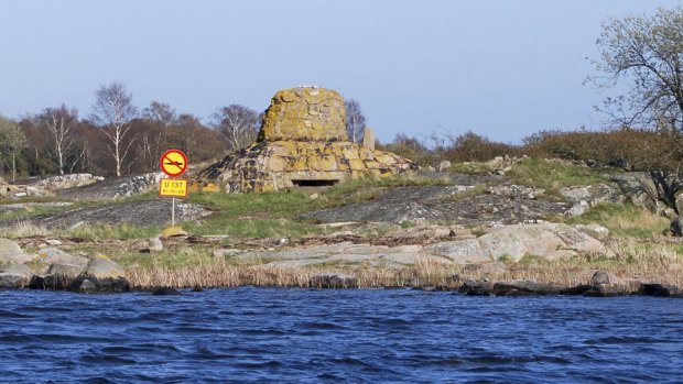 A mock road-traffic sign prohibiting submarines marks the site where a Russian Whiskey-class submarine ran aground near the Swedish naval port of Karlskrona in 1981, triggering a diplomatic crisis. 