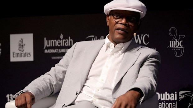 Samuel L Jackson speaks on stage at the Dubai International Film Festival.