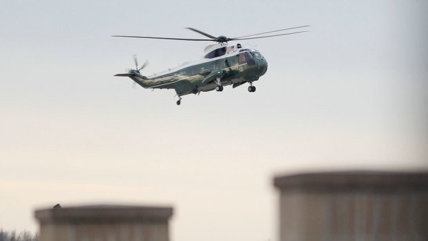 Marine One, with US President Donald Trump aboard, lands at Dover Air Force Base  to meet with family  of William "Ryan" Owens, 36,  who died in the Yemen raid.