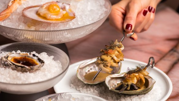 Abalone and mushroom with scallop and oyster dishes.