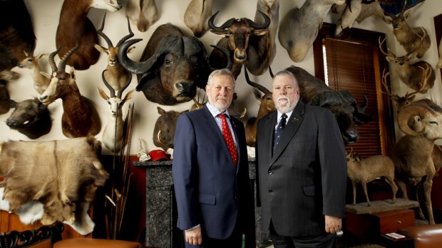 Shooters party members Robert Borsak and Robert Brown in the Billiard room of Mr Borsak's Ashfield home.