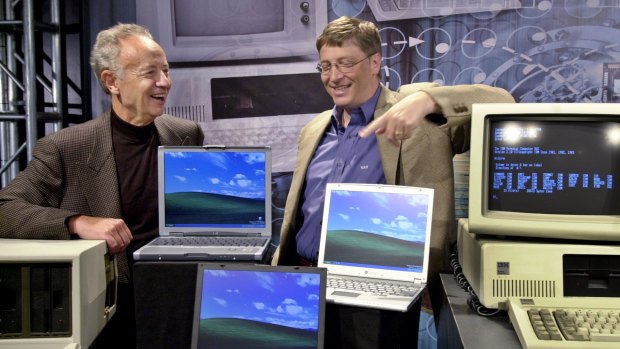 Intel chairman Andrew Grove with Microsoft founder Bill Gates in 2001.
