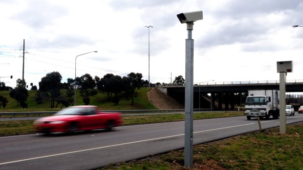 Sixty-one per cent of speeding vehicles captured on ACT fixed speed cameras, such as this one on the Monaro Highway, were registered interstate.