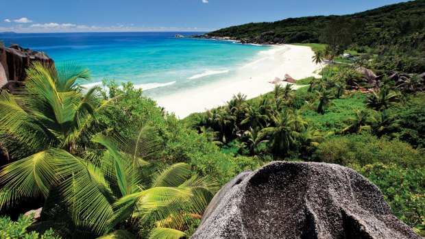 A beach in the Seychelles where TitanTrade website operator One Tech Media is located.  