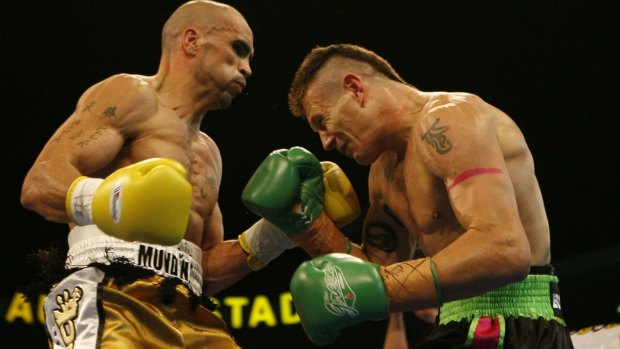 Squaring up: Green and Mundine in their 2006 showdown.