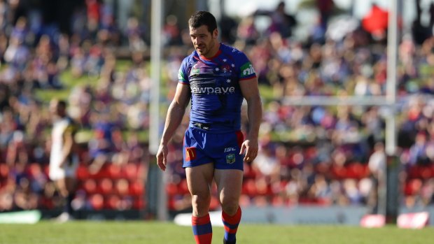 Stunned: Jarrod Mullen left the field five minutes before half-time suffering concussion.