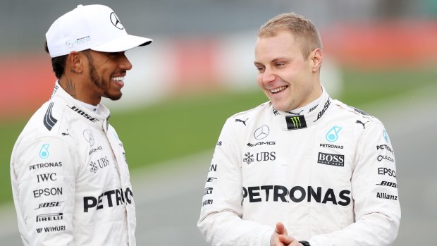 Lewis Hamilton and his new Mercedes GP teammate, Valtteri Bottas of Finland, share a joke.
